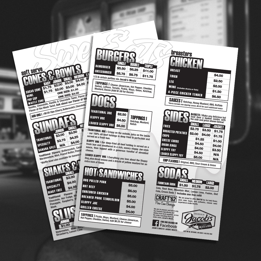 Black and white Jacob's Sweets and Eats menu sheets with food items and prices on a blurred background