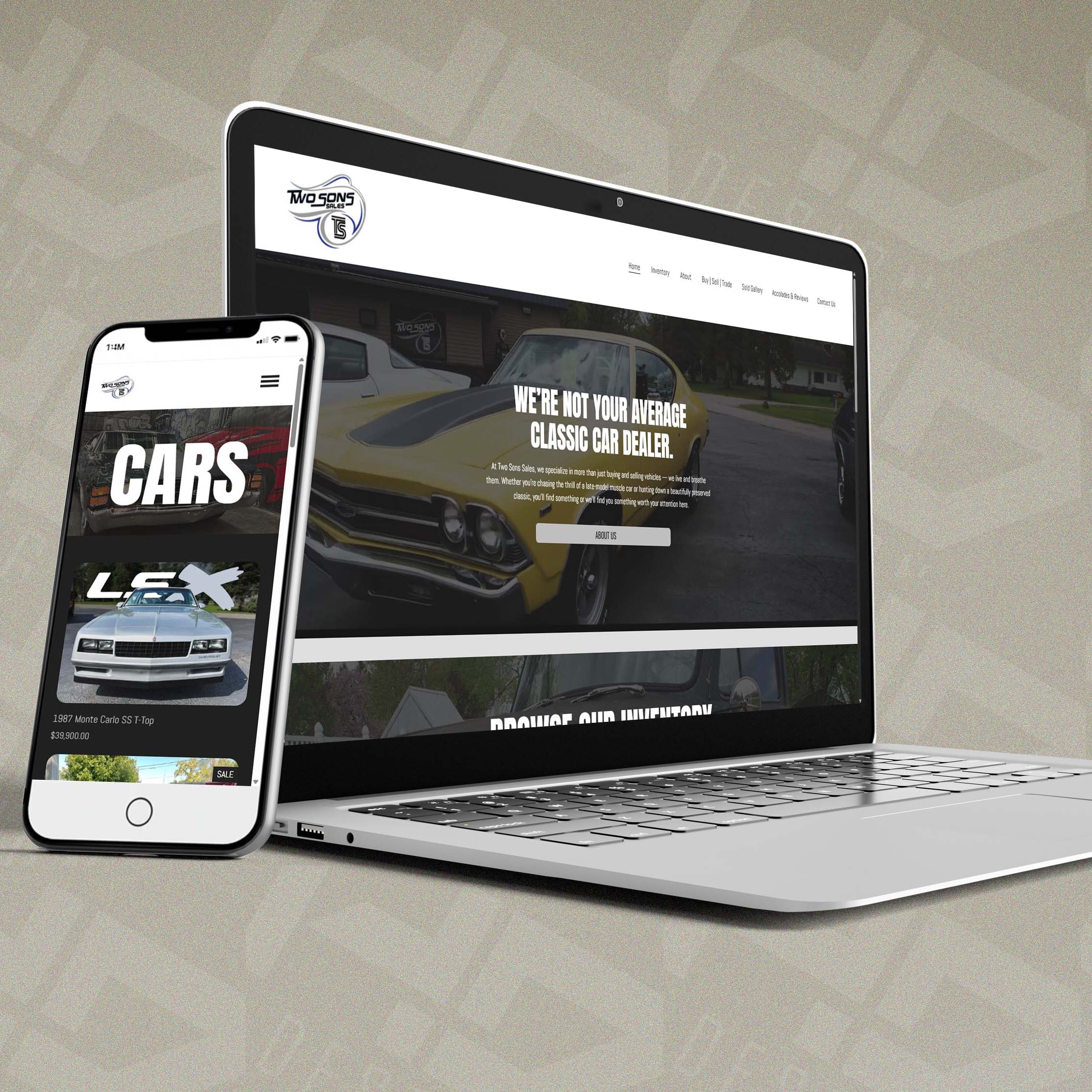 Laptop and smartphone displaying a car dealership website by HD Designs LTD on a textured background