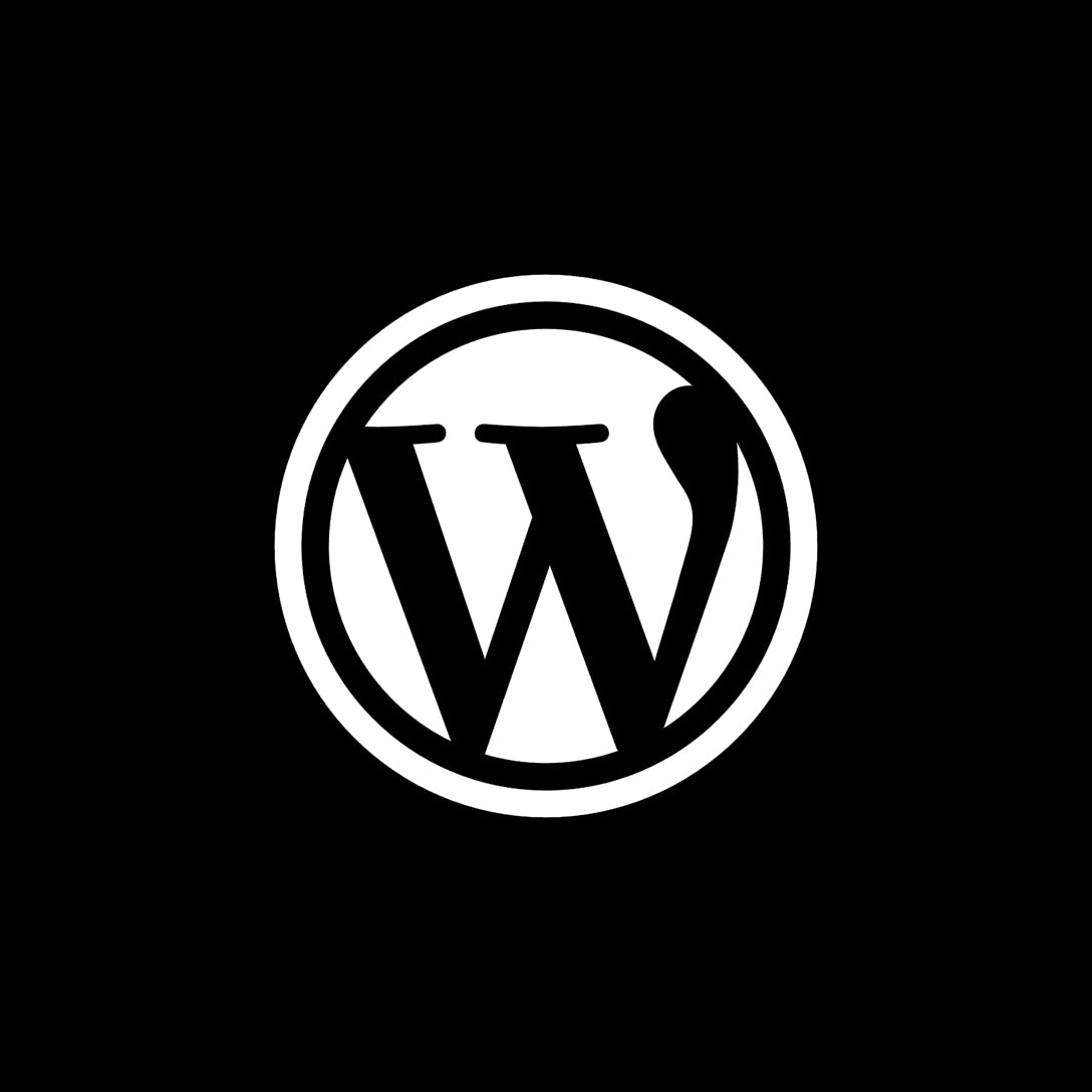 Black and white WordPress logo on a black background